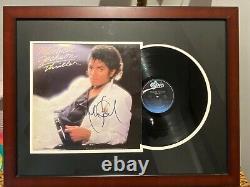 Authentic Michael Jackson Thriller Album Personally signed and encased