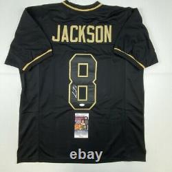 Autographed/Signed LAMAR JACKSON Baltimore Blackout Football Jersey JSA COA