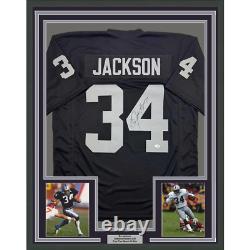 Framed Autographed/Signed Bo Jackson 35x39 Oakland Black Football Jersey JSA COA
