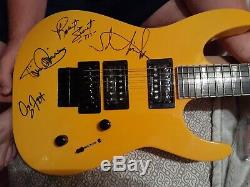JACKSON AUTOGRAPHED GUITAR by STRYPER, CHRISTIAN ROCK GROUP