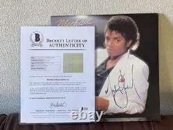 MICHAEL JACKSON AUTOGRAPHED SIGNED THRILLER LP AND LARGE SHEET withBECKETT LOA
