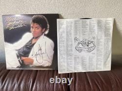 MICHAEL JACKSON AUTOGRAPHED SIGNED THRILLER LP AND LARGE SHEET withBECKETT LOA