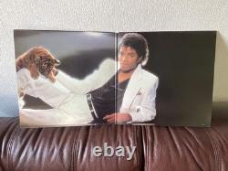 MICHAEL JACKSON AUTOGRAPHED SIGNED THRILLER LP AND LARGE SHEET withBECKETT LOA