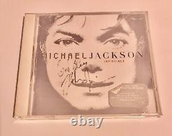 Michael Jackson CD Invincible Autographed by Chris Tucker&Rodney Jerkins 2003
