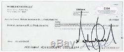 Michael Jackson Signed & Endorsed Check (New York, 2001) PSA/DNA with orig Photo