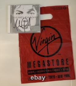 Michael Jackson Signed Invincible CD From 2001 Virgin Megastore Event withshop bag