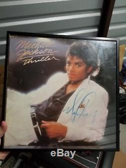 Michael Jackson autographed Thriller album cover