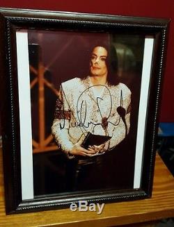 Michael Jackson autographed photo. Authentic Real signature not a copy! Signed