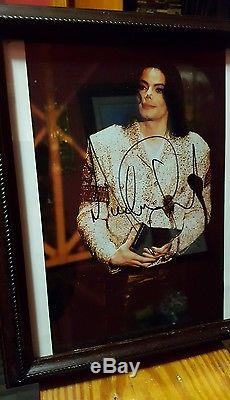 Michael Jackson autographed photo. Authentic Real signature not a copy! Signed