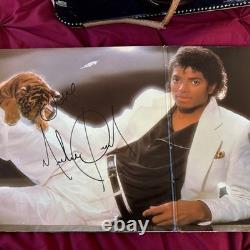 Thriller by Michael Jackson Autographed By MJ. Sold By Juliens Auctions Rare